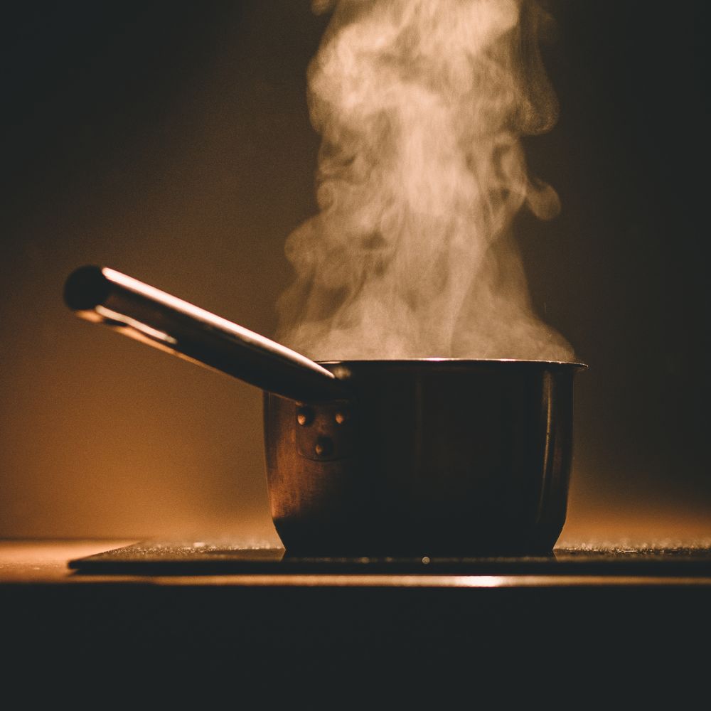 a pot steaming on a counter